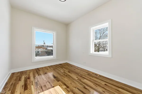 a view of a room that has a window in it