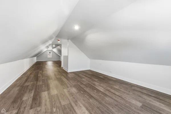 a view of a hallway with stairs