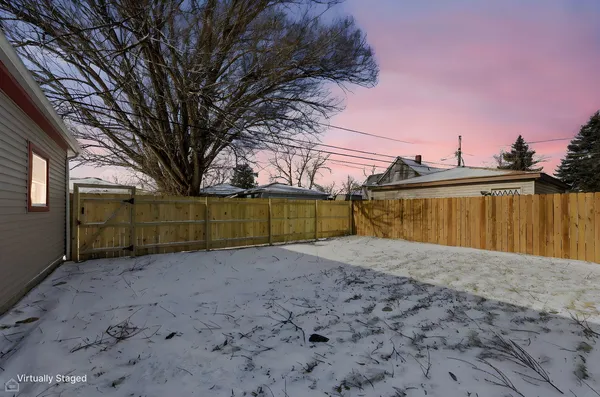 a view of a backyard of the house