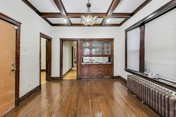 a kitchen with granite countertop cabinets stainless steel appliances and a sink