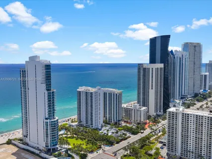 a view of a city with tall buildings