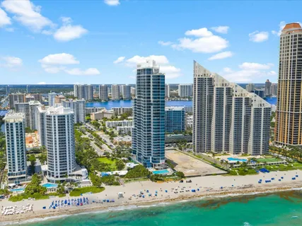 a view of a city with tall buildings