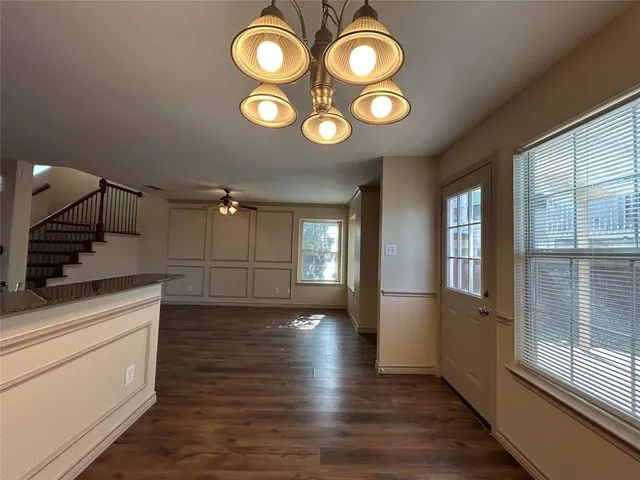 a view of a kitchen with a sink and dishwasher