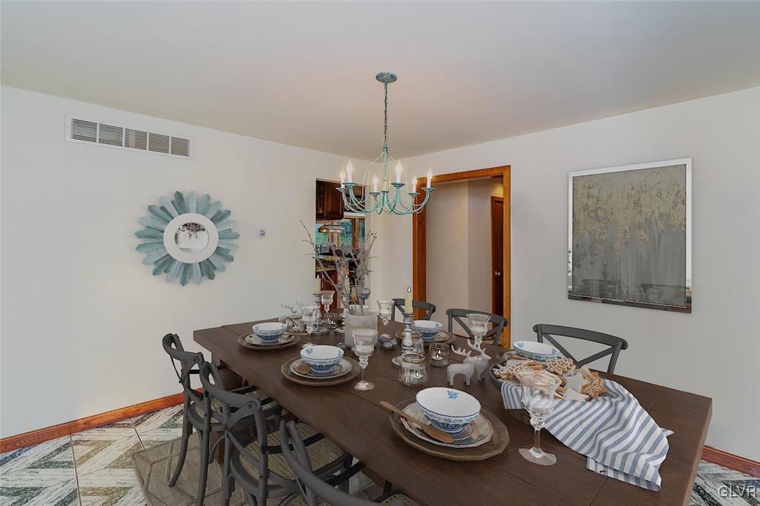 5275 Chestnut Hill Road Center Valley, PA 18034 - Photo 10 of 34 Virtually staged photo of dining room