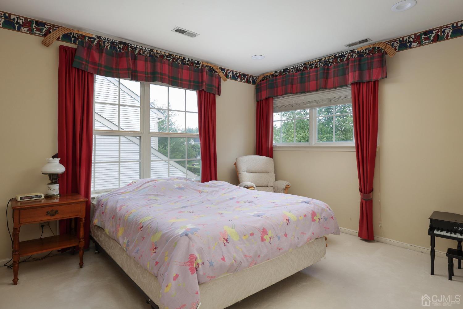 7 Yardley Manor Drive Old Bridge, NJ 07747 - Photo 14 of 23 a bedroom with a bed and a window