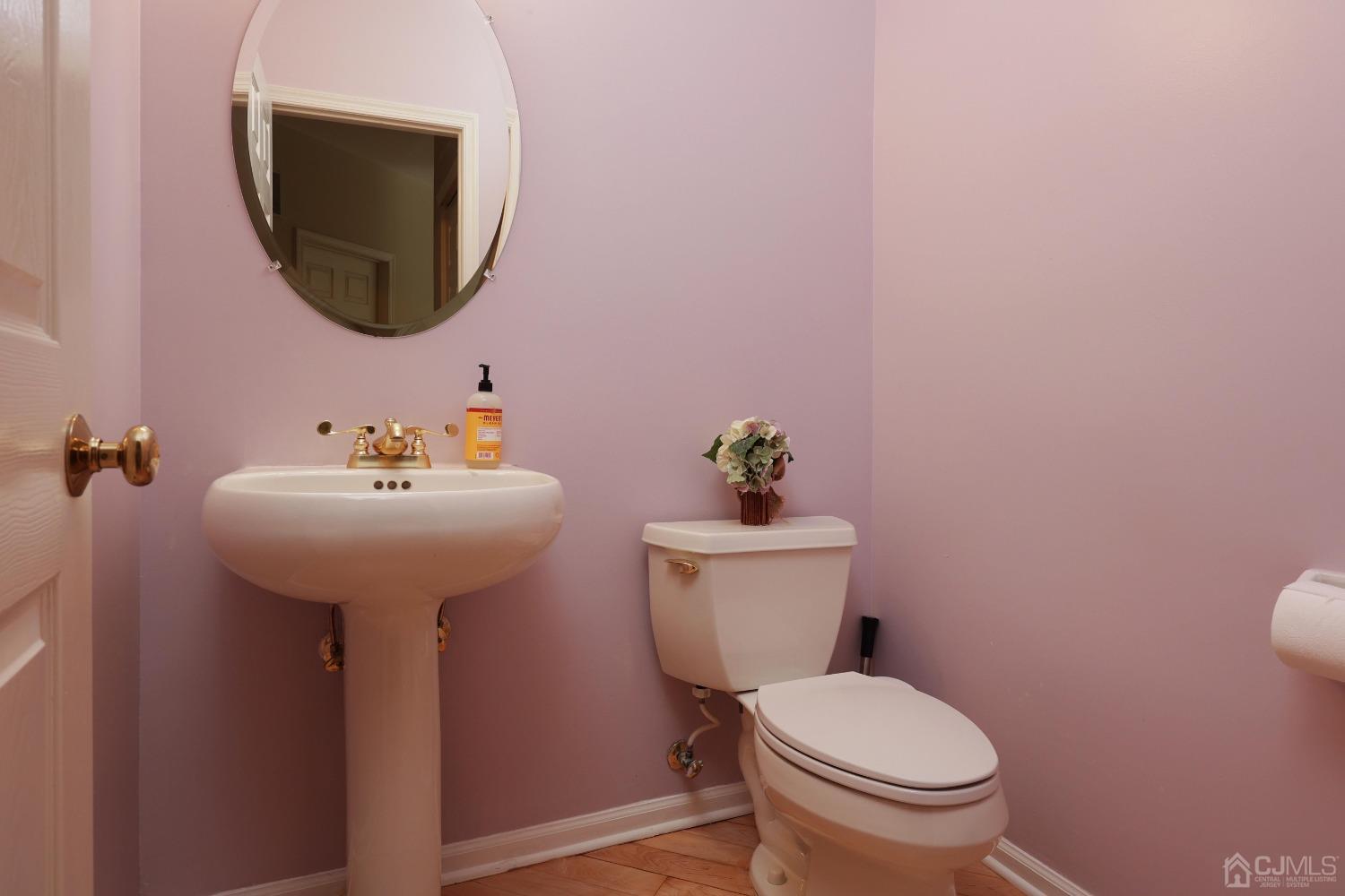 7 Yardley Manor Drive Old Bridge, NJ 07747 - Photo 18 of 23 a bathroom with a toilet sink and mirror