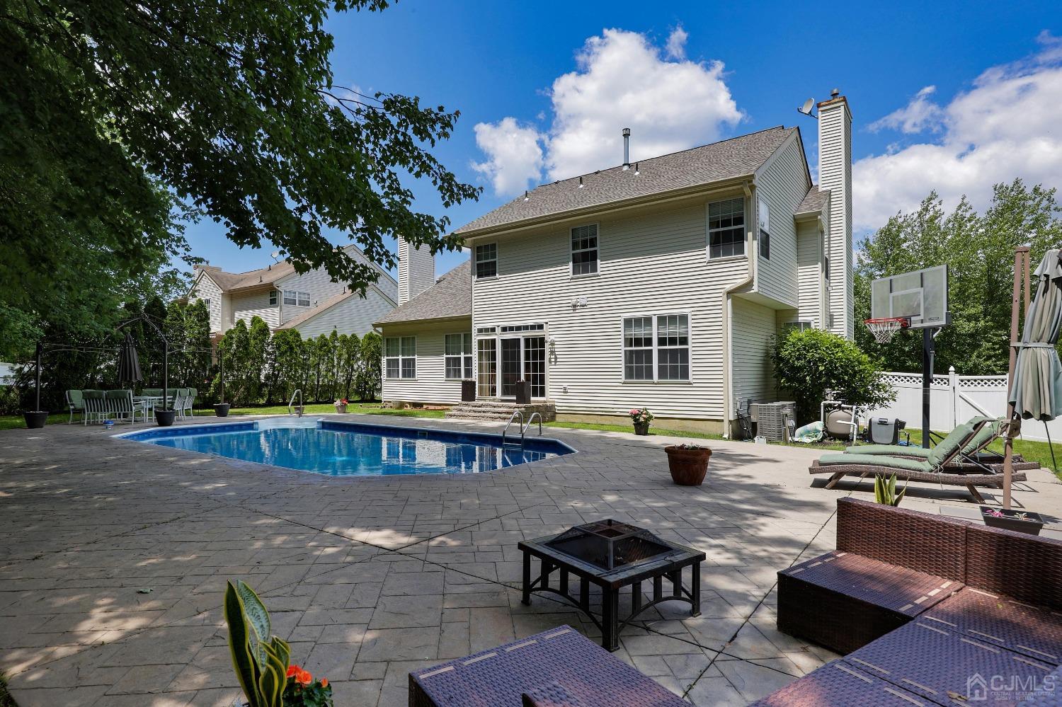7 Yardley Manor Drive Old Bridge, NJ 07747 - Photo 22 of 23 a view of a house with backyard and sitting area