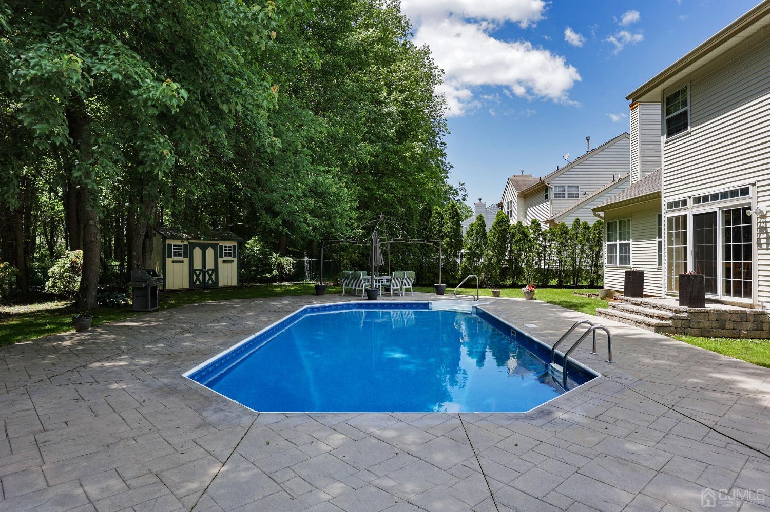7 Yardley Manor Drive Old Bridge, NJ 07747 - Photo 23 of 23 a view of outdoor space yard swimming pool and having patio