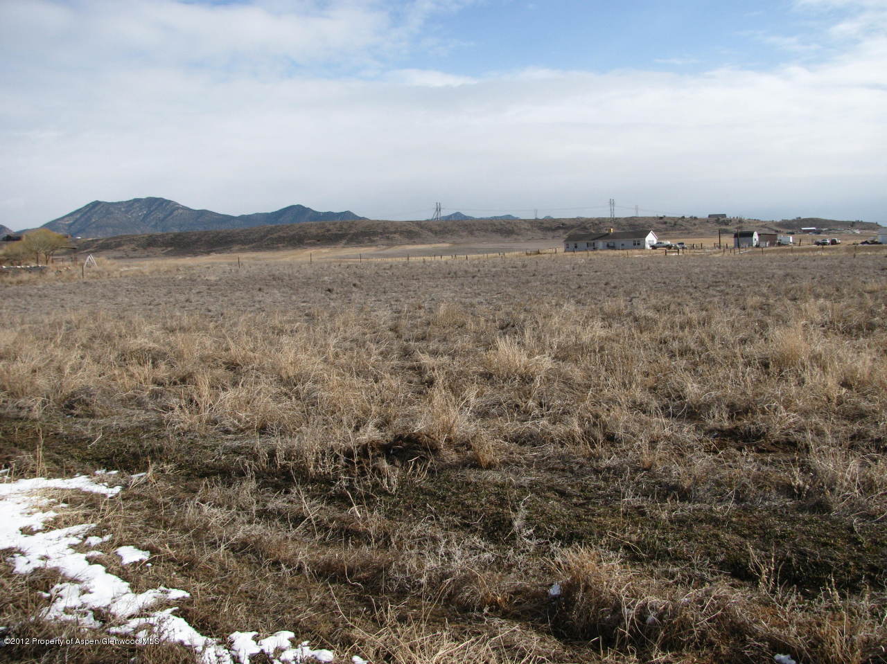 293 County Road 293, Unit LOT 3 Rifle, CO 81650 - Photo 2 of 5 a view of lake and mountain