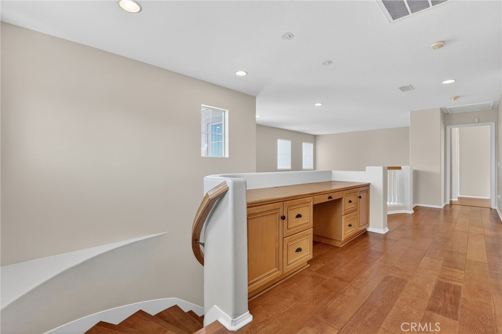 20543 Pesaro Porter Ranch Porter Ranch, CA 91326 - Photo 28 of 67 a spacious bathroom with a double vanity sink and a mirror