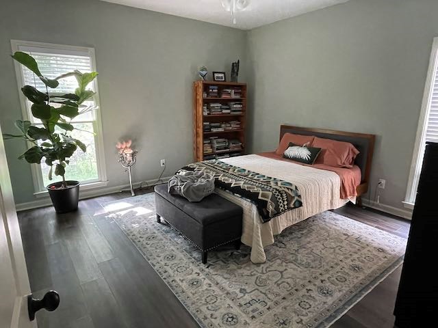 3619 4th Avenue Columbus, GA 31904 - Photo 4 of 4 a bedroom with a bed and a potted plant