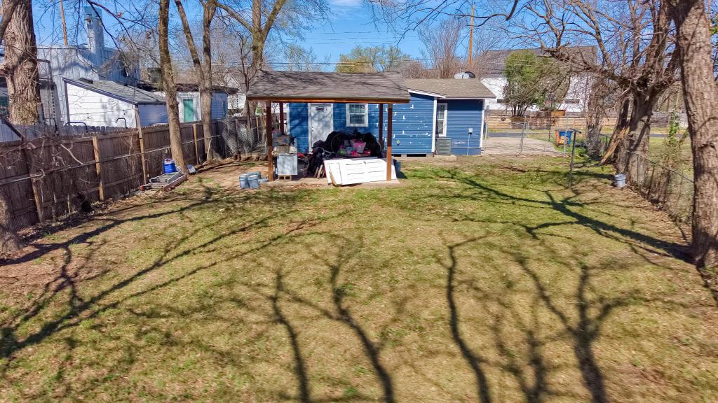 5309 Prock Lane Austin, TX 78721 - Photo 11 of 19 a view of a house with a yard