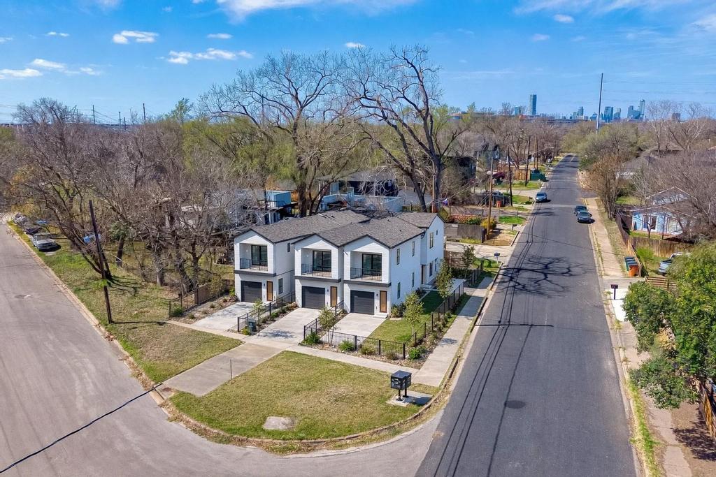 5309 Prock Lane Austin, TX 78721 - Photo 22 of 22 a view of a house with a yard