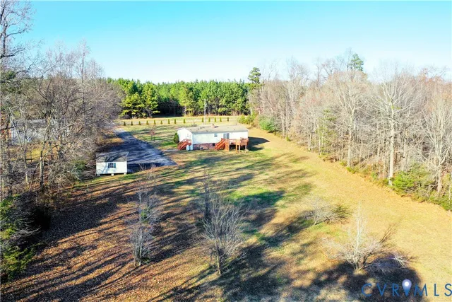 a view of a yard with an outdoor space