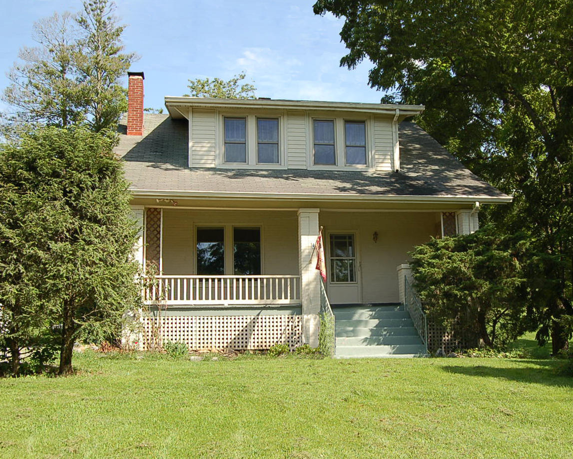 48 Fields Avenue Blue Ridge, VA 24064 - Photo 1 of 46 a front view of a house with a garden