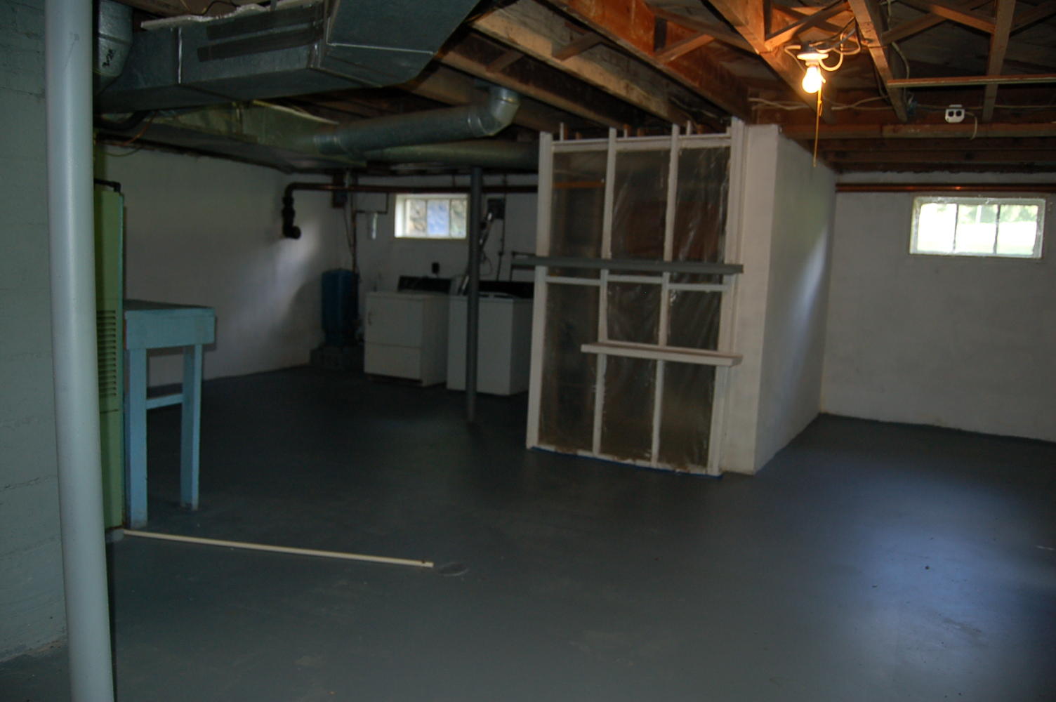 48 Fields Avenue Blue Ridge, VA 24064 - Photo 34 of 46 a view of an empty room with wooden floor and windows