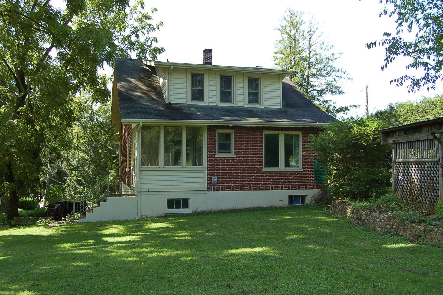 48 Fields Avenue Blue Ridge, VA 24064 - Photo 41 of 46 a front view of a house with a garden