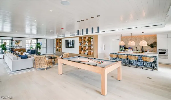 a living room with furniture and a table