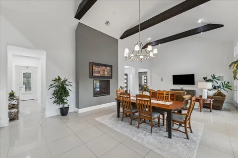 a view of a dining room with furniture