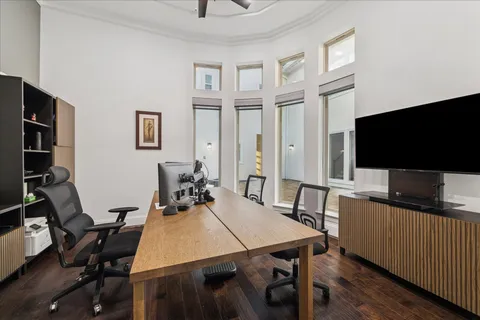 a view of a workspace with furniture