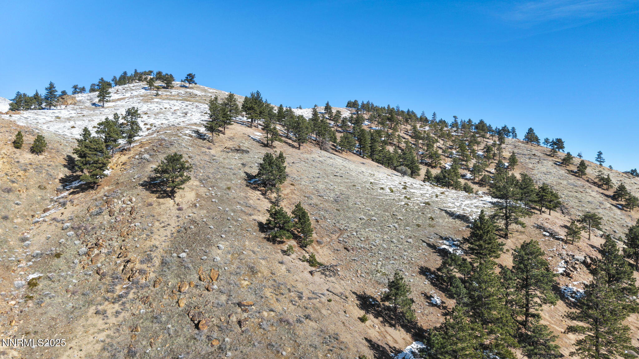 0 Apn 081-160-15 Road Reno, NV 89523 - Photo 6 of 10 a view of a large building with a mountain in the background