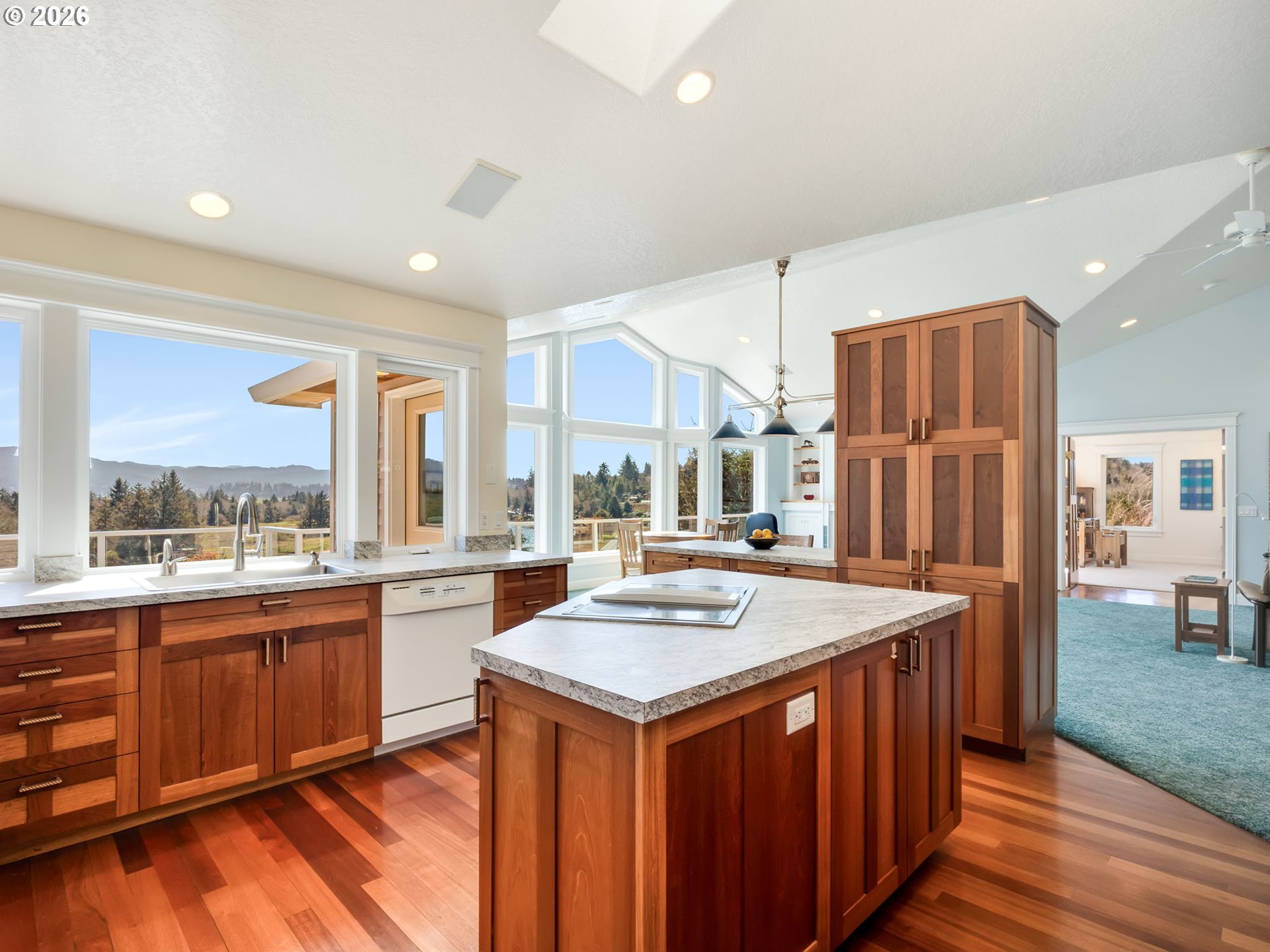 14115 Riverview Meadows Lane Nehalem, OR 97131 - Photo 13 of 39 a kitchen with a stove a sink and a refrigerator