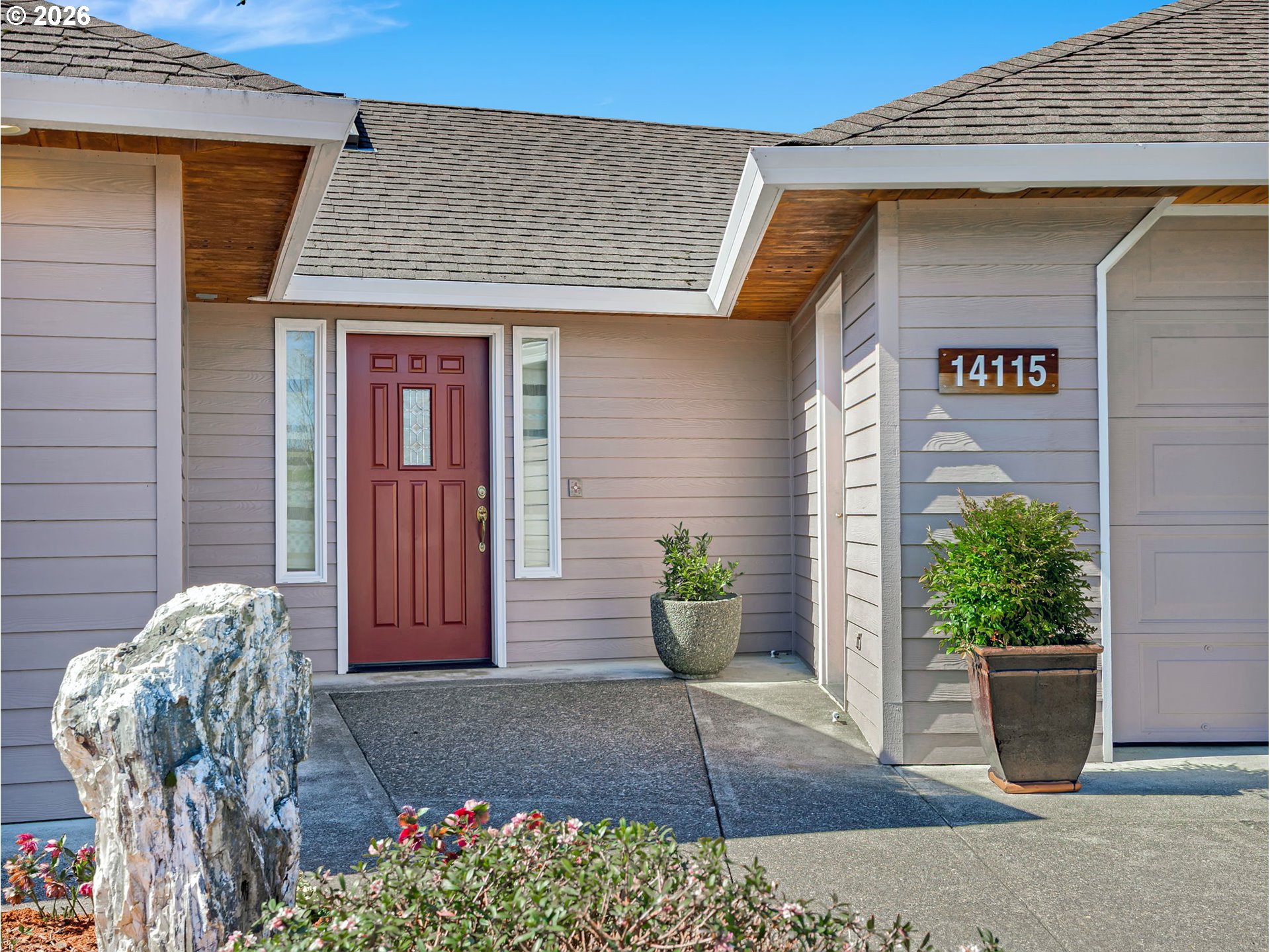 14115 Riverview Meadows Lane Nehalem, OR 97131 - Photo 3 of 39 a front view of a house