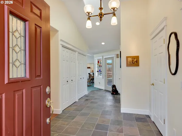a view of a livingroom with furniture and windows