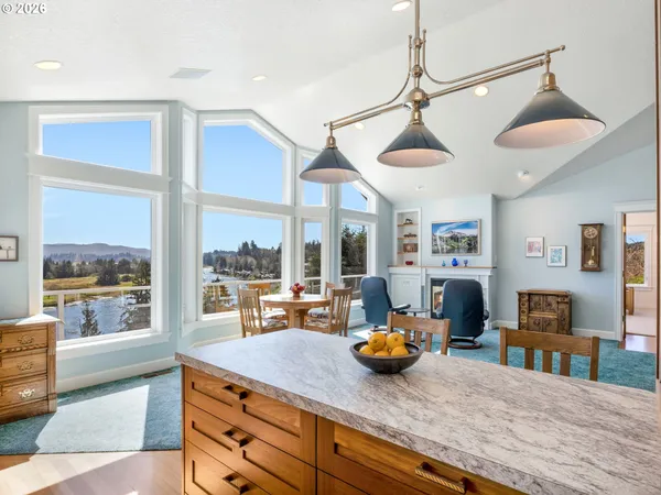 a view of living room with furniture and window