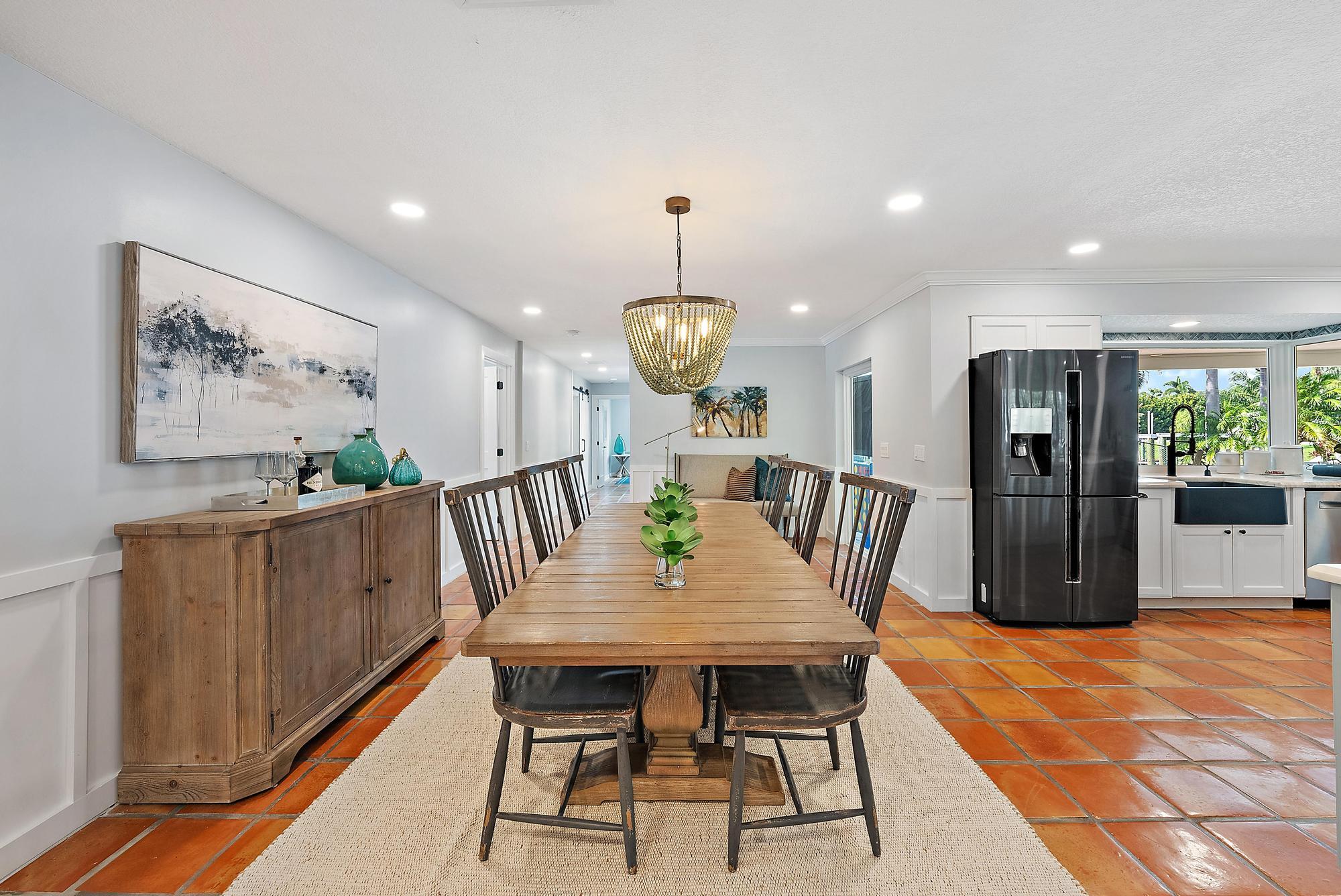 12821 Ellison Wilson Road North Palm Beach, FL 33408 - Photo 14 of 40 a view of a dining room with furniture