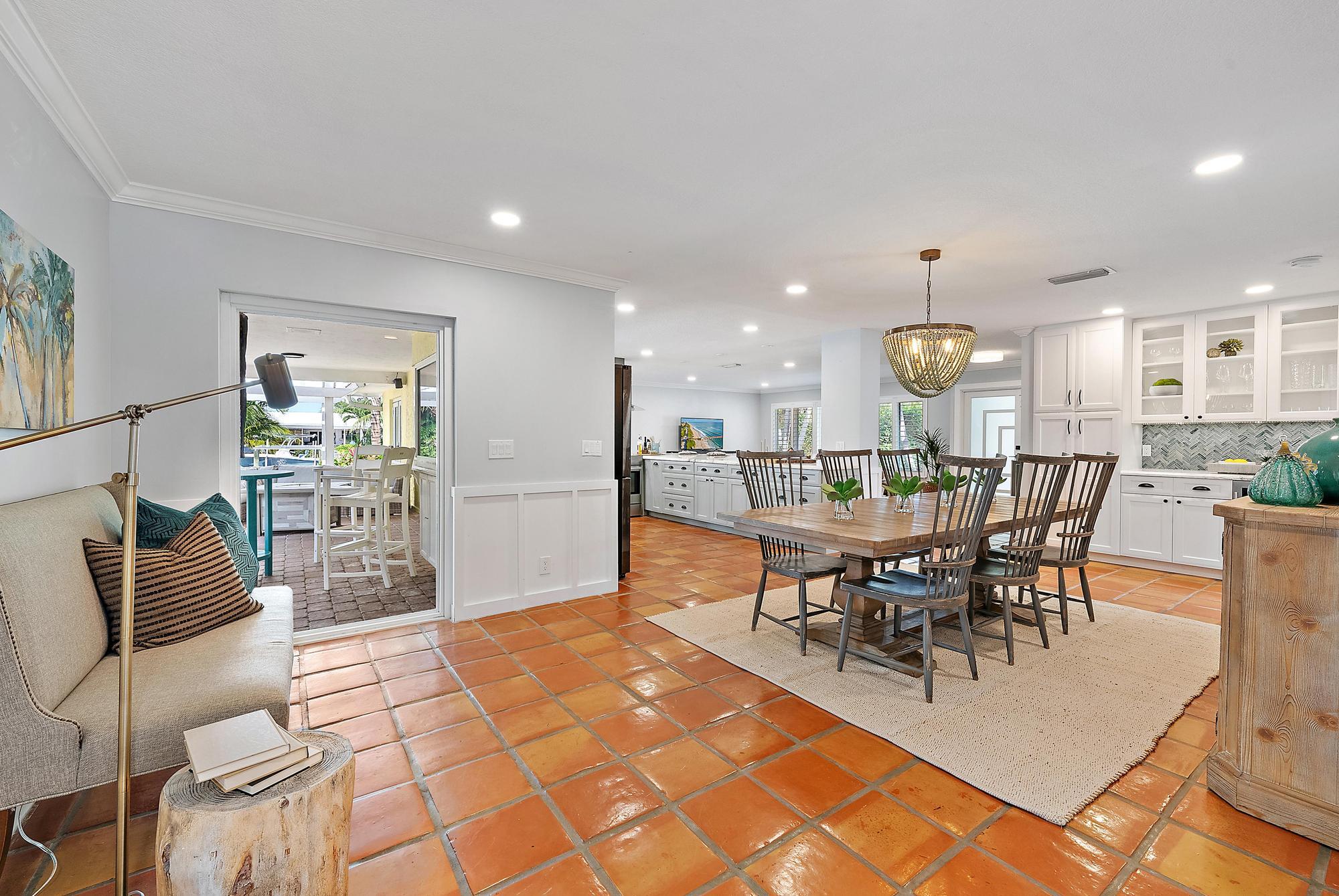 12821 Ellison Wilson Road North Palm Beach, FL 33408 - Photo 15 of 40 a view of a dining area with furniture