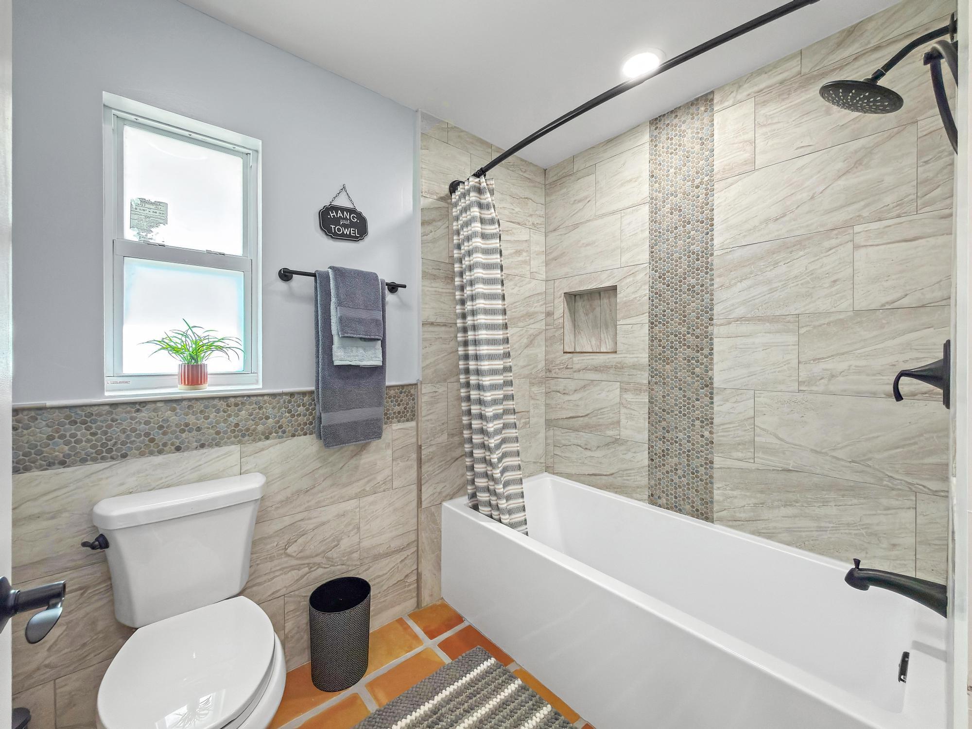 12821 Ellison Wilson Road North Palm Beach, FL 33408 - Photo 21 of 40 a bathroom with a toilet and a shower