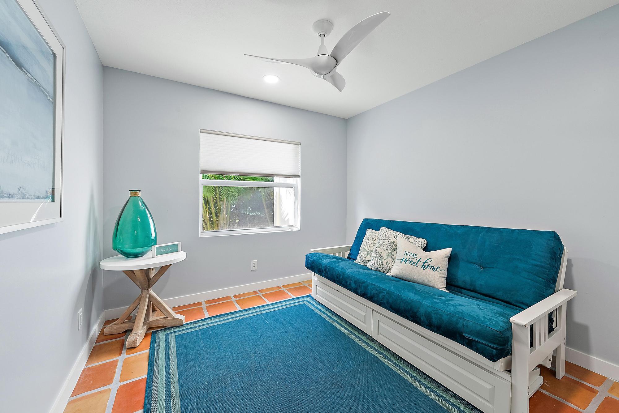 12821 Ellison Wilson Road North Palm Beach, FL 33408 - Photo 23 of 40 a living room with furniture and a window