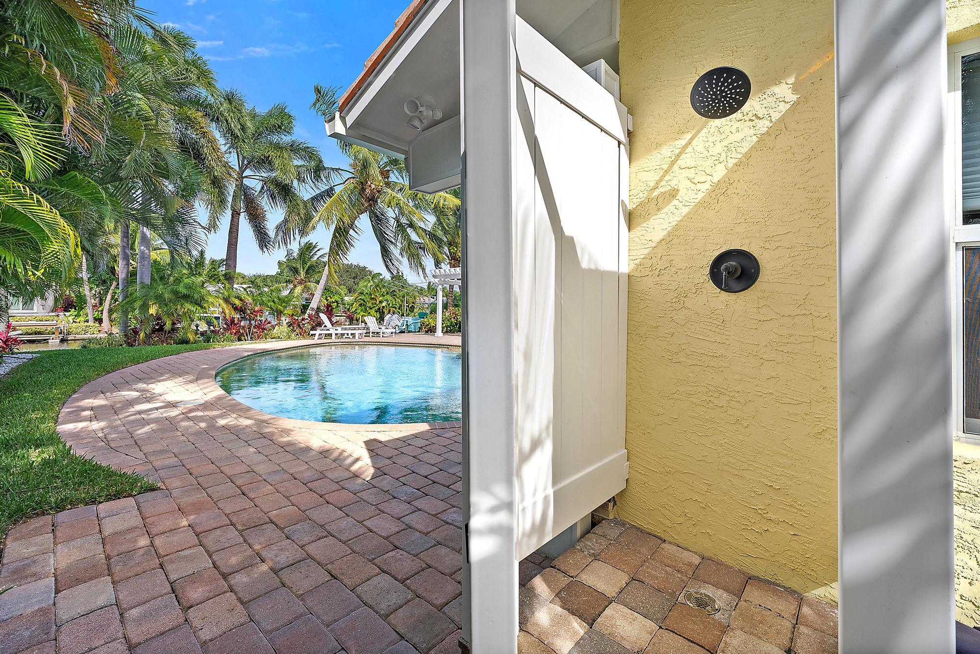 12821 Ellison Wilson Road North Palm Beach, FL 33408 - Photo 30 of 40 a view of a door back yard of the house