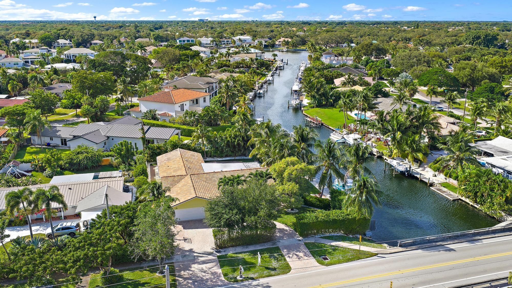 12821 Ellison Wilson Road North Palm Beach, FL 33408 - Photo 37 of 40 an aerial view of residential houses with outdoor space and trees