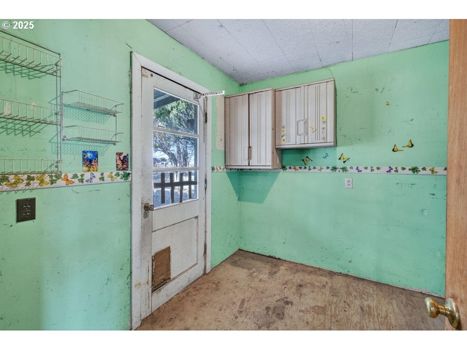 3464 Rimrock Acres Loop Prineville, OR 97754 - Photo 15 of 48 a kitchen with window and cabinets