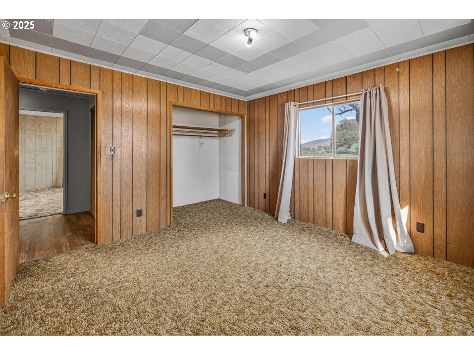 3464 Rimrock Acres Loop Prineville, OR 97754 - Photo 22 of 48 a view of a room with a fireplace and a window