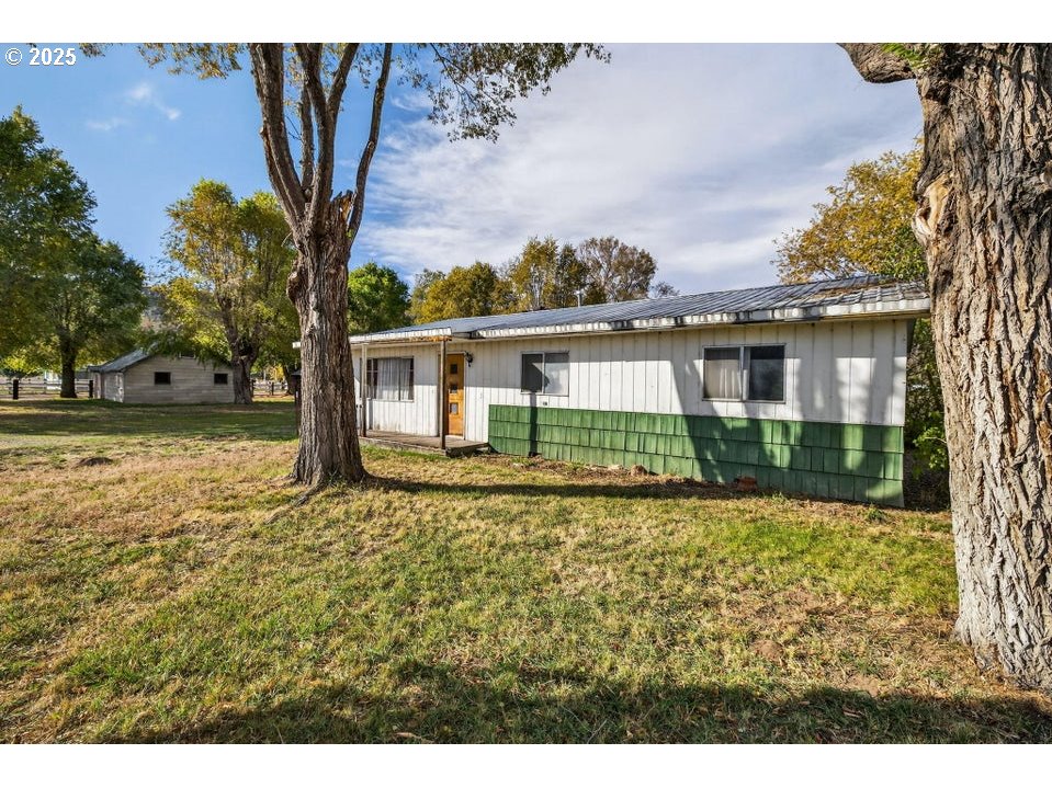 3464 Rimrock Acres Loop Prineville, OR 97754 - Photo 27 of 48 a view of a house with a yard