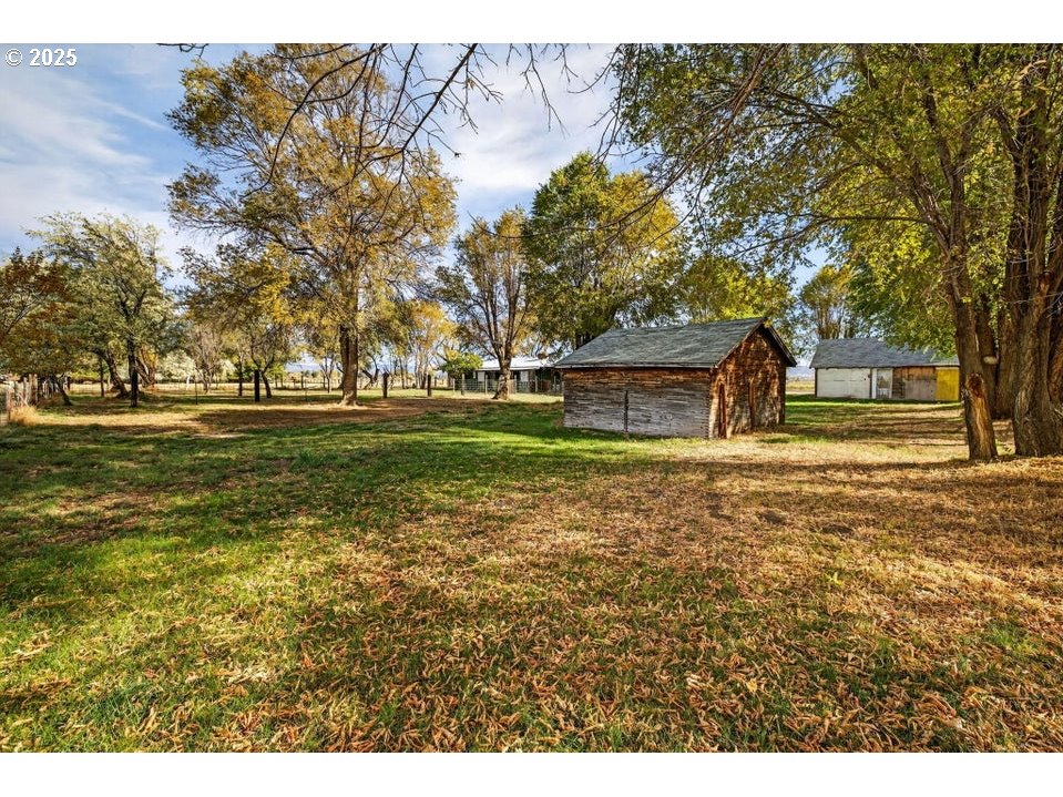 3464 Rimrock Acres Loop Prineville, OR 97754 - Photo 43 of 48 a front view of a house with a yard