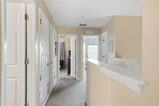 a bathroom with a tub shower and sink