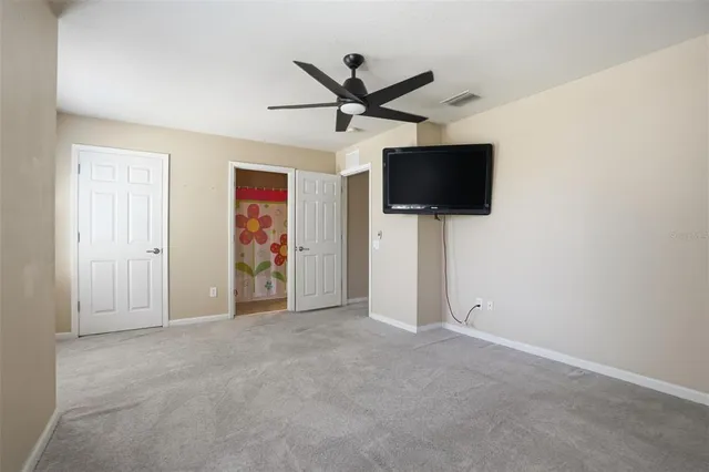 a view of a livingroom with a flat screen tv