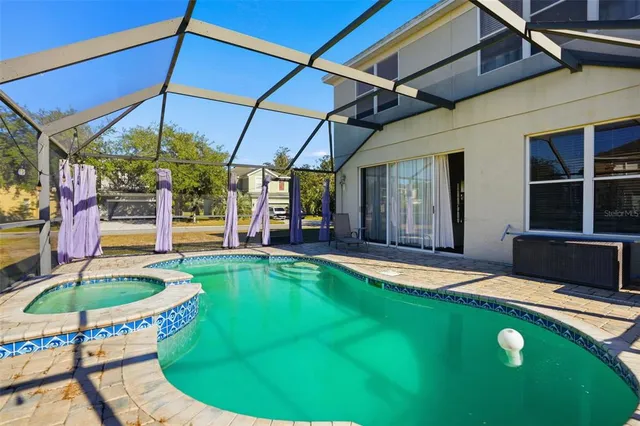 a swimming pool with yard