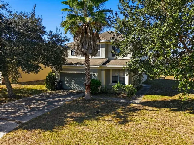 a front view of a house with a ocean view