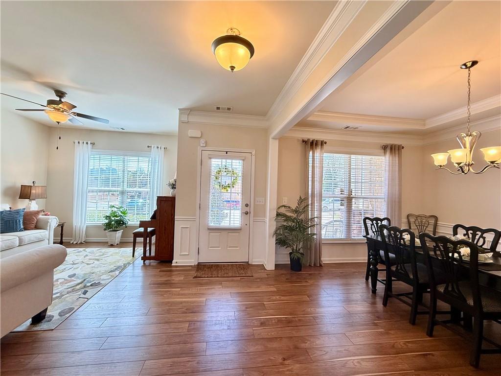 3451 Graham Way Southwest Lilburn, GA 30047 - Photo 3 of 66 a view of a a dining room with furniture window and wooden floor