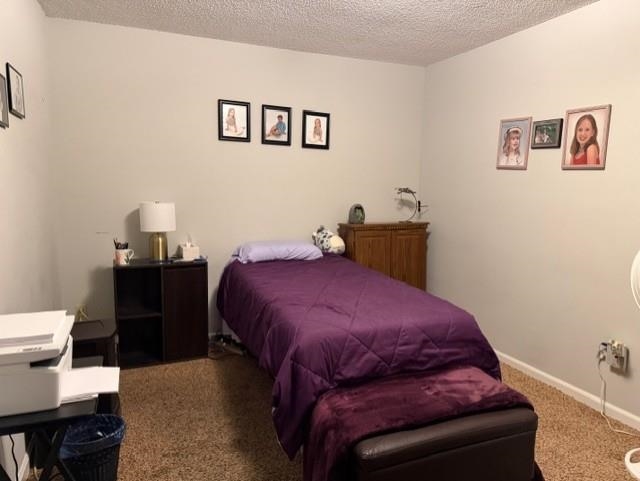 1099 Peyton Ridge Drive Collierville, TN 38017 - Photo 12 of 15 a bedroom with a bed and wooden floor