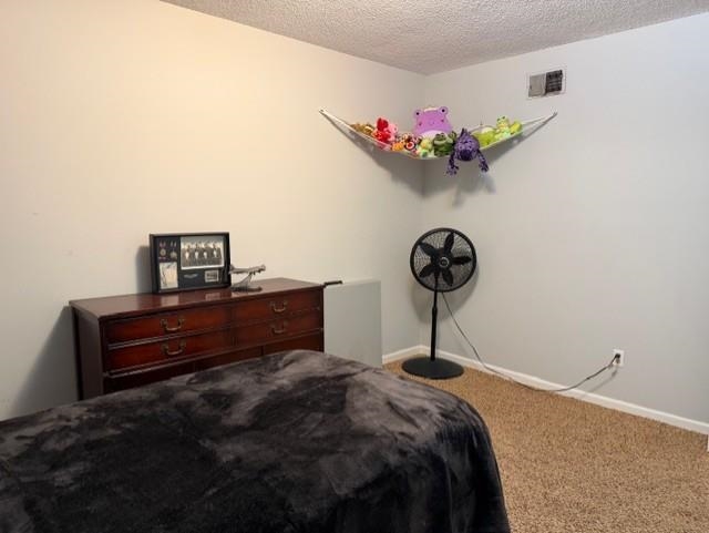 1099 Peyton Ridge Drive Collierville, TN 38017 - Photo 13 of 15 a bedroom with a bed and a chandelier