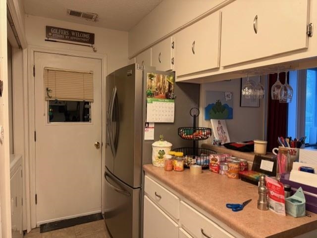 1099 Peyton Ridge Drive Collierville, TN 38017 - Photo 15 of 15 a kitchen with stainless steel appliances a refrigerator and cabinets