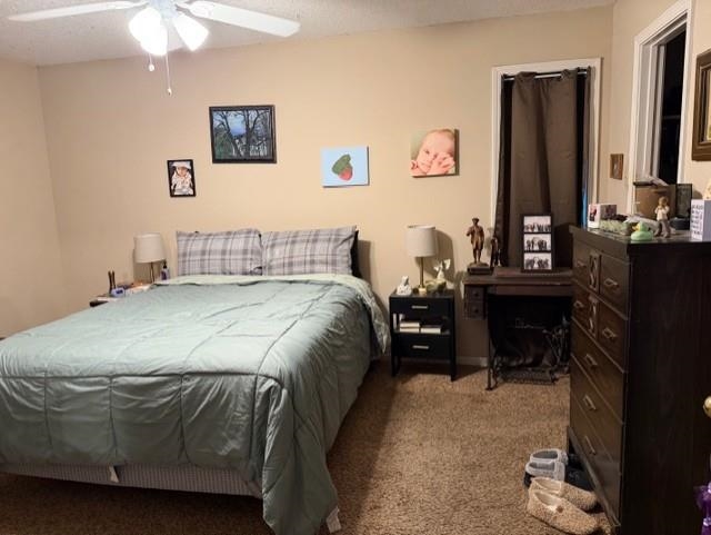 1099 Peyton Ridge Drive Collierville, TN 38017 - Photo 6 of 15 a bedroom with a bed and a dresser