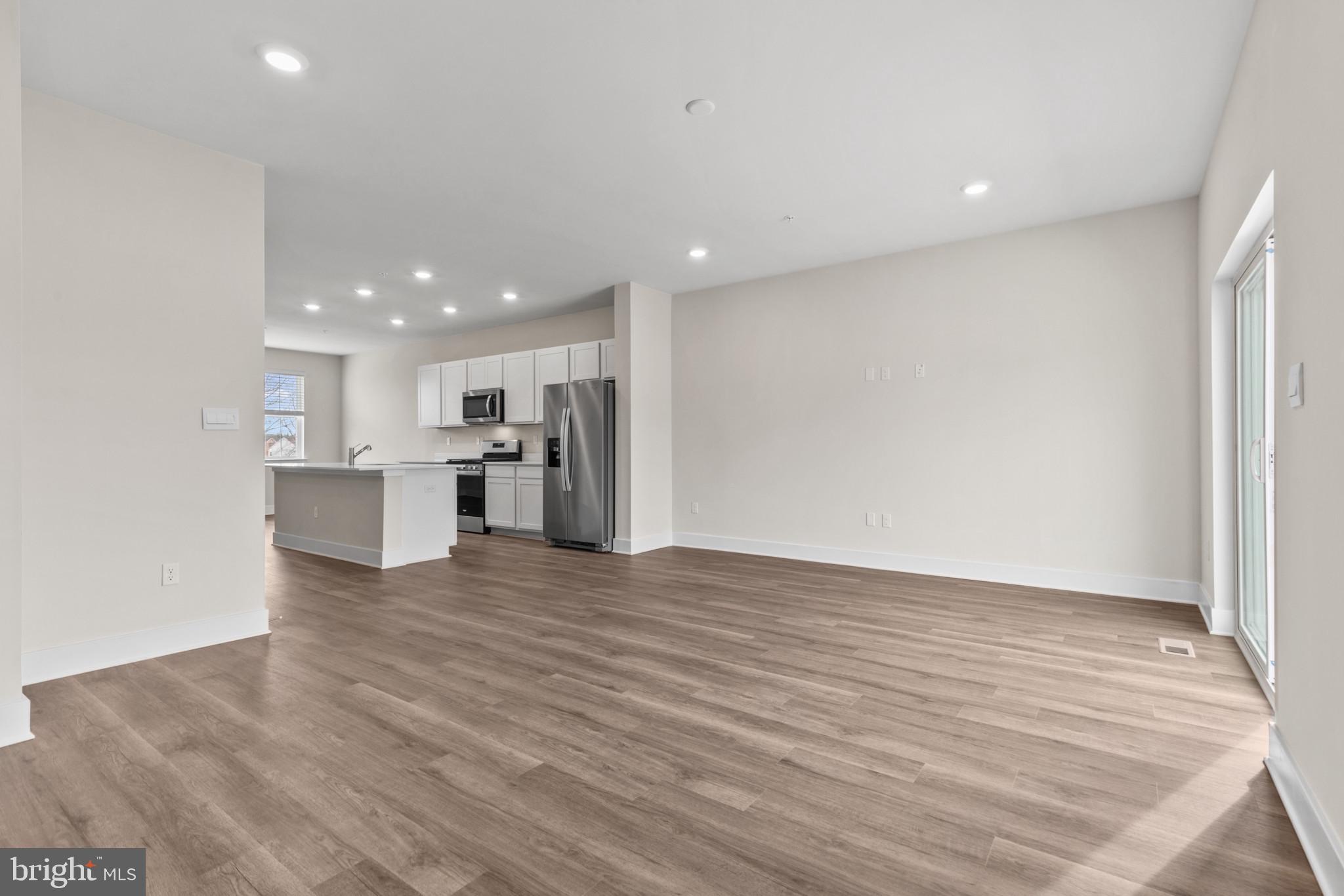 330 Hackley Drive Joppa, MD 21085 - Photo 16 of 32 a view of kitchen with kitchen island and stainless steel appliances