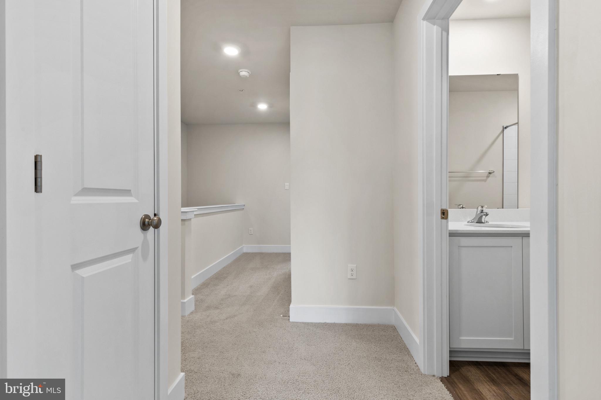 330 Hackley Drive Joppa, MD 21085 - Photo 18 of 32 a view of a bathroom from the hallway